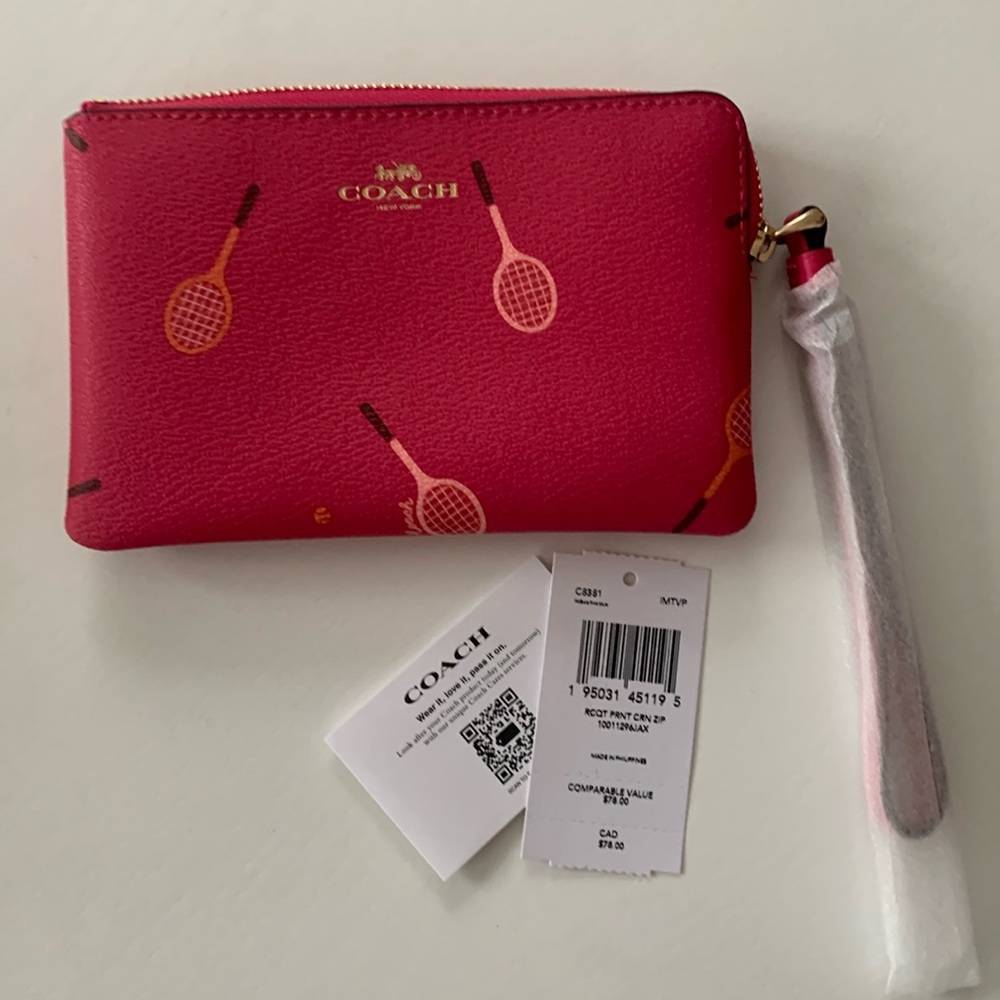 COPY - Pink bracket print wristlet Coach
